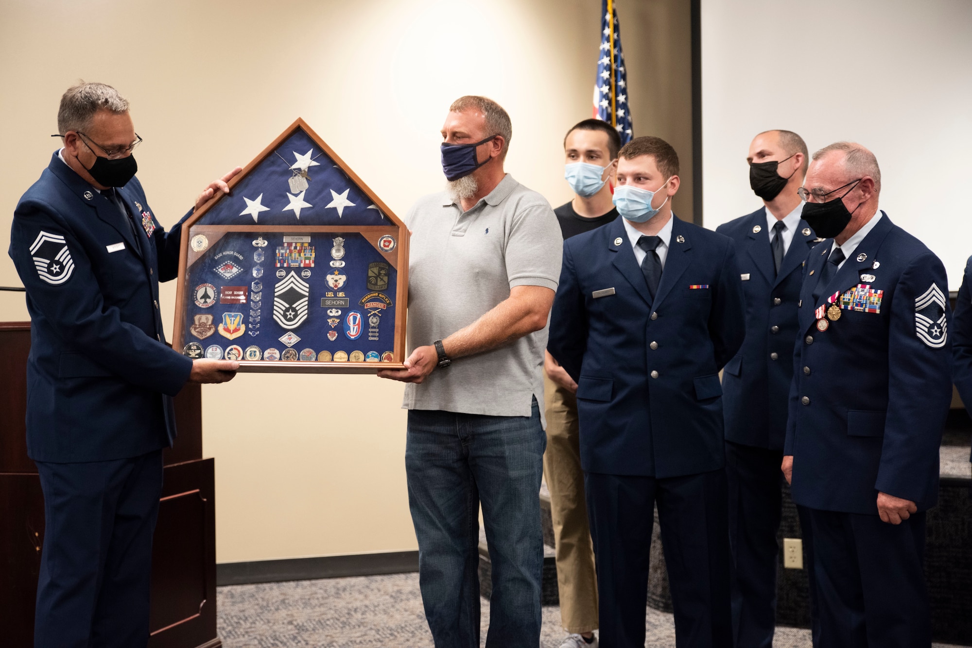 The 188th Logistics Readiness Squadron, vehicle maintenance section, presents Chief Master Sgt. Ricky D. Sehorn with a shadow box at his retirement ceremony, held on September, 11, 2021, at Ebbing Air National Guard Base, AR. Sehorn’s career spanned more than 36 years in the United States armed forces including the Army and Air National Guard.