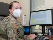 Lt. Col. Deborah Klein, 919th Special Operation Wing's newest judge advocate, takes time for a photo in her office at Duke Field, Fla. Sept. 11, 2021. Klein is a traditional reservist who specializes in operational law and international enviromental law. Her office is open during Unit Training Assembly weekends to support commanders with military justice issues as well as assist members with any legal readiness issues they need to help with such as wills, powers of attorney, and Service Members Civil Relief Act inquiries. (U.S. Air Force photo by Michelle Gigante)