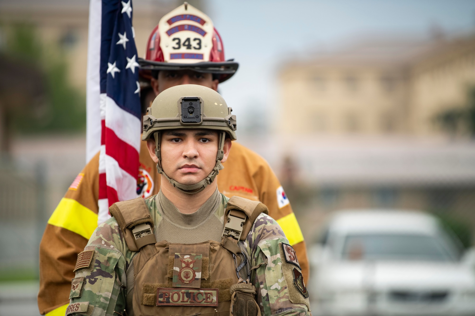 First responders participate in a remembrance ceremony.