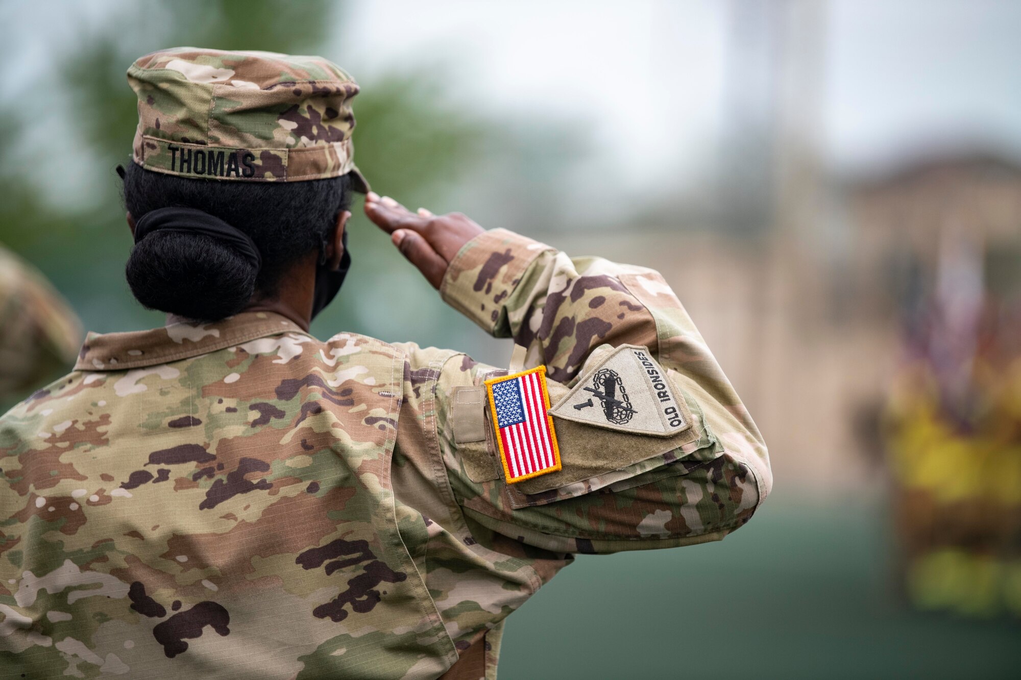 A soldier renders a salute.