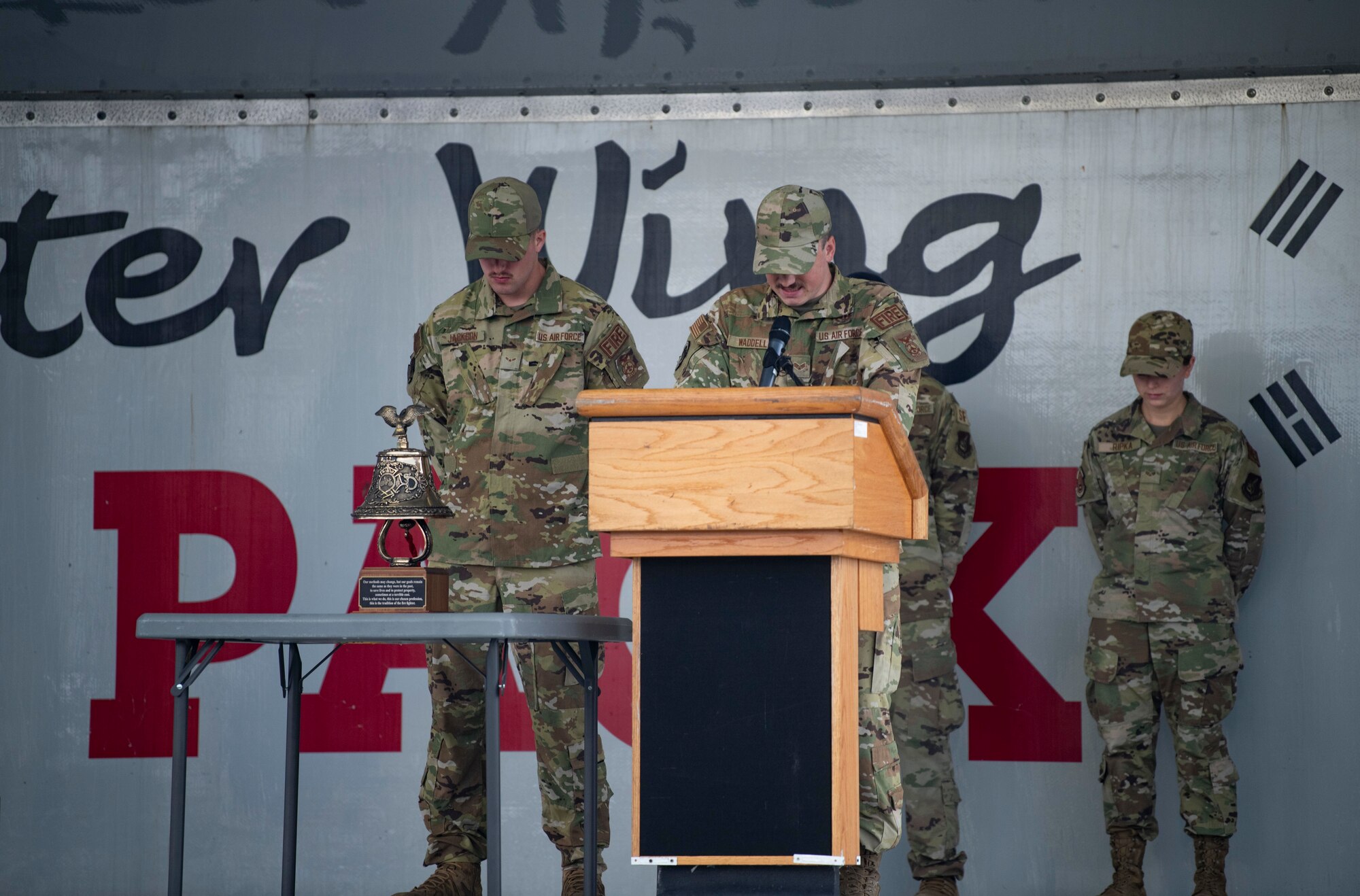 Airmen recite a prayer.