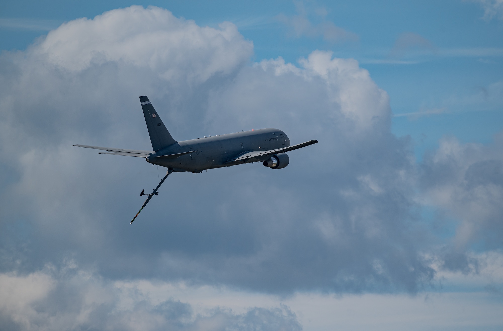 A KC-46A Pegasus, assigned to the 157th Air Refueling Wing, performs a low boom pass in front of thousands of spectators during the Thunder Over New Hampshire air show, Sept. 11. The two-day air show was the first at Pease in more than a decade and brought an estimated 80,000 visitors to the base. (U.S. Air National Guard photo by Staff Sgt. Tim Hayden)