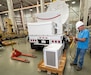 Photo of  Chris Katchmar installing an environmental control unit