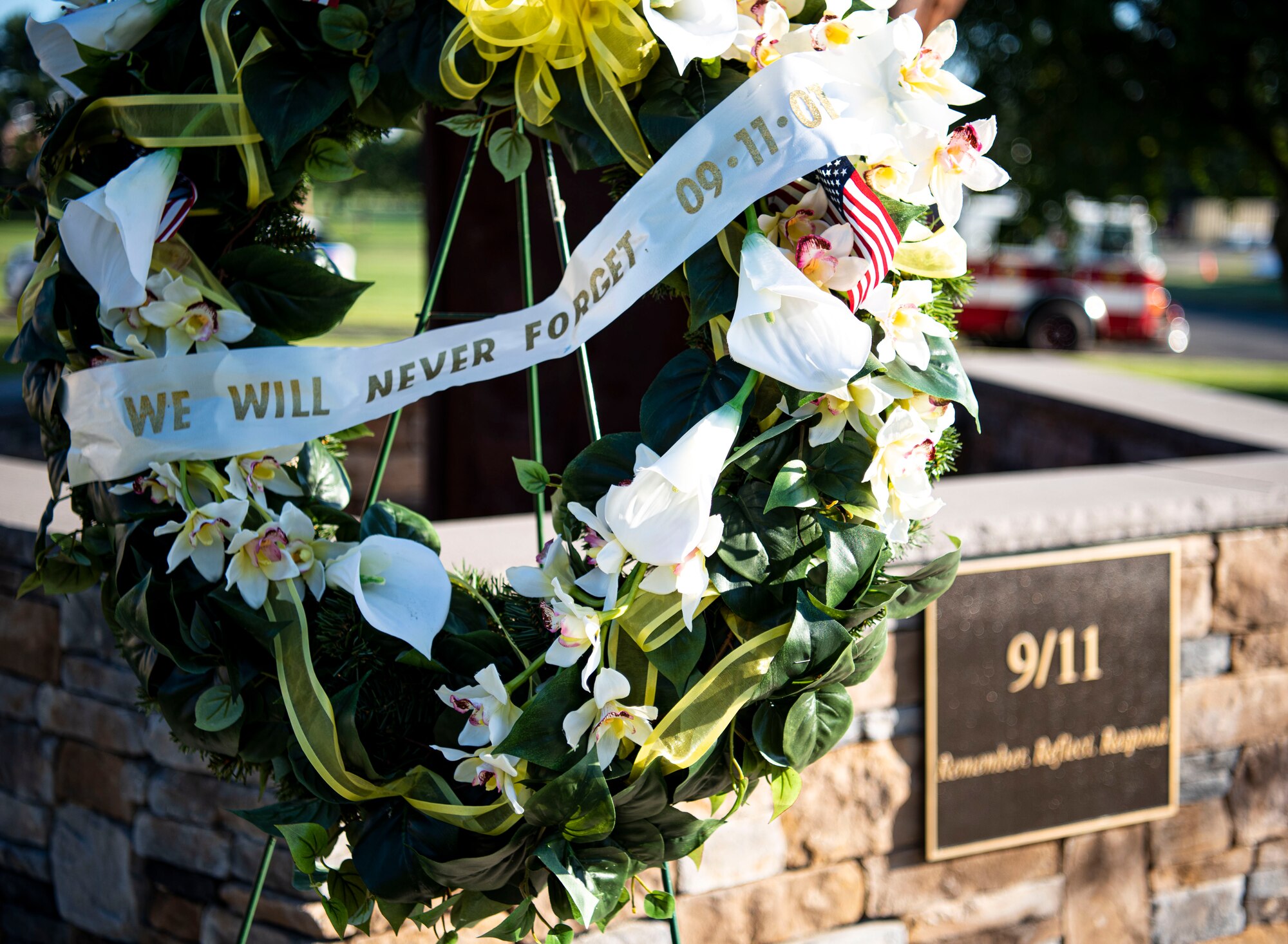 A commemorative wreath is displayed in honor of the 9/11 20th Anniversary ceremony held at Joint Base McGuire-Dix-Lakehurst, N.J. Sept. 9, 2021. The event was held to honor the 20th anniversary of 9/11 where 2,977 victims lost their lives and more than 6,000 were left injured. (U.S. Air Force Photo by Airman 1st Class Matthew Porter)