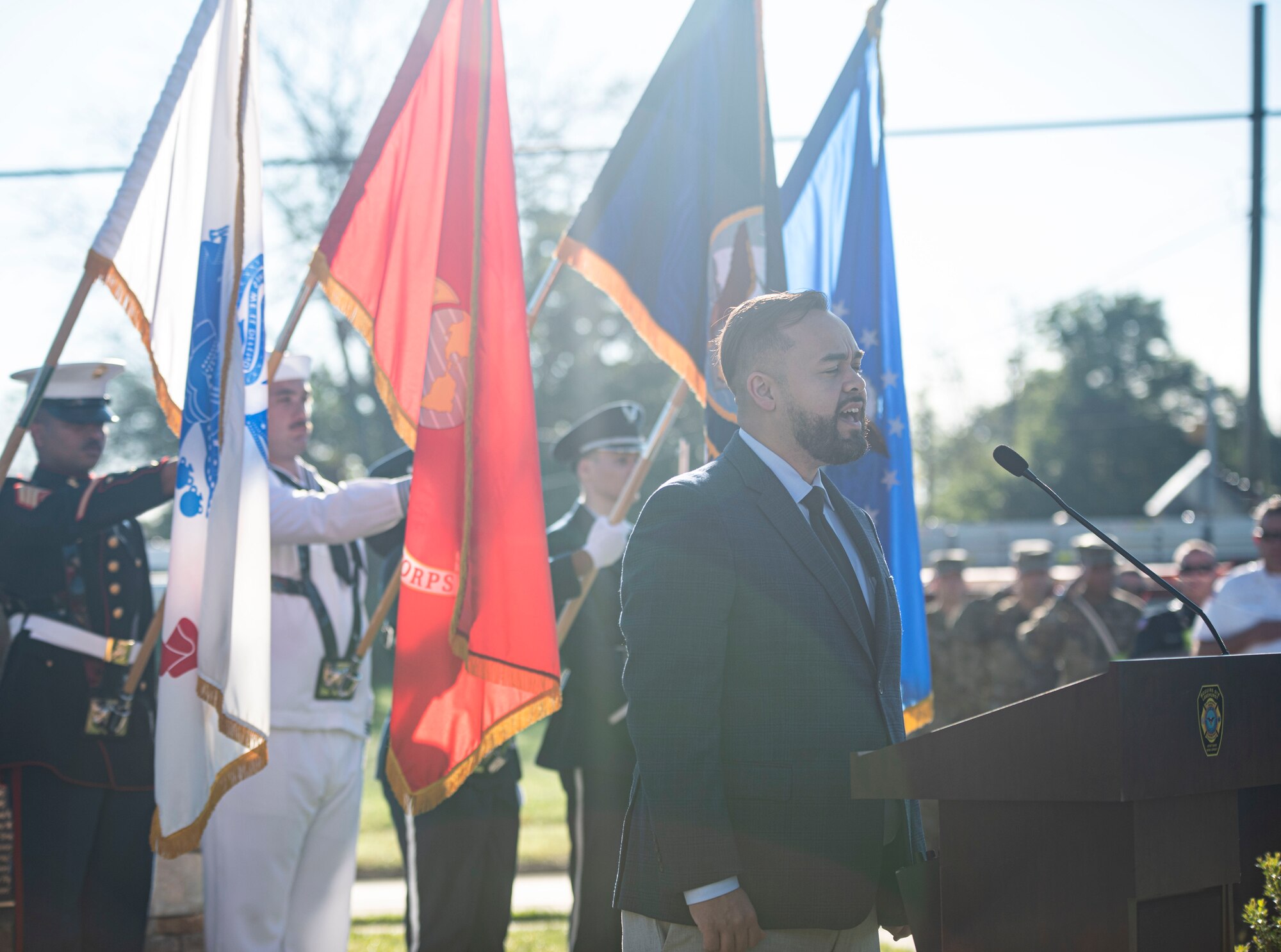 Members of the Joint Base Honor Guard present colors during the National Anthem for the 9/11 20th Anniversary at Joint Base McGuire-Dix-Lakehurst, N.J. Sept. 9, 2021. The event was held to honor the 20th anniversary of 9/11 where 2,977 victims lost their lives and more than 6,000 were left injured. (U.S. Air Force Photo by Airman 1st Class Matthew Porter)