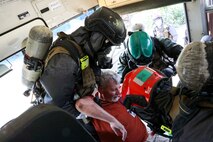 Belle, West Virginia (August 28, 2021) – U.S. Marines from The Chemical Biological Incident Response Force practice decontamination measures during a notional response to an emergency involving train colliding with a bus in Belle, West Virginia. Vigilant Guard is an annual large-scale disaster response exercise sponsored by the U.S. Northern Command in conjunction with the National Guard Bureau that brings federal, state, and local military personnel, public safety, first responders, and private sector partners together. The multi-day, hands-on and stimulated training exercise supports the development, enhancement, and interoperability of disaster response assets within a joint environment. (U.S. Marine Corps Photo by Staff Sgt. Kristian S. Karsten/Not Released)