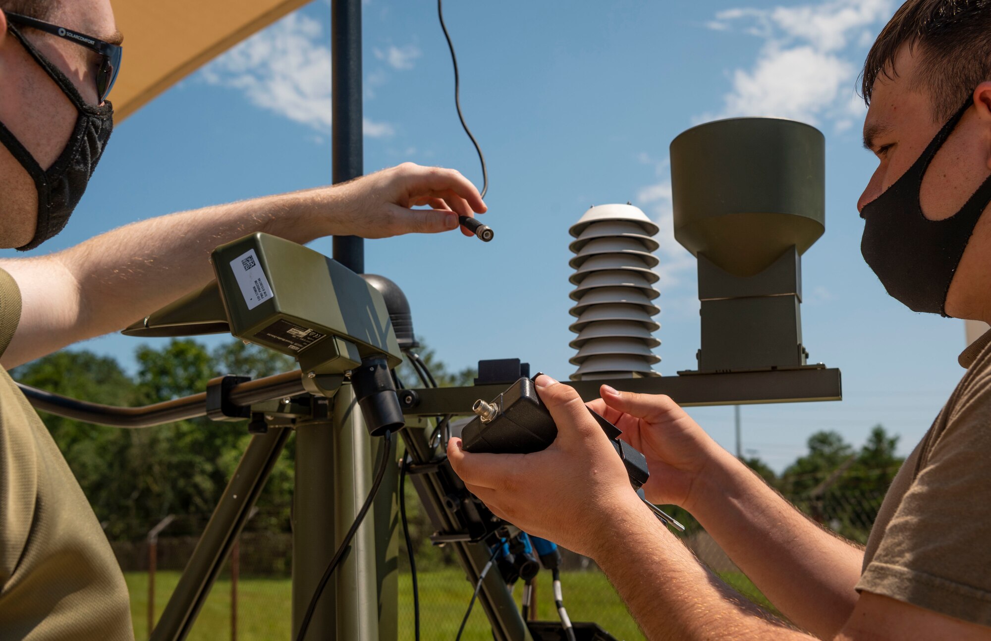 Airmen fix a tactical meteorological observing system