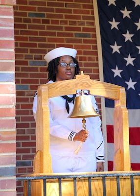 Yeoman 1st Class Shaqwala R. Vega rings a bell in memory of those who died on 9/11 during a memorial ceremony.