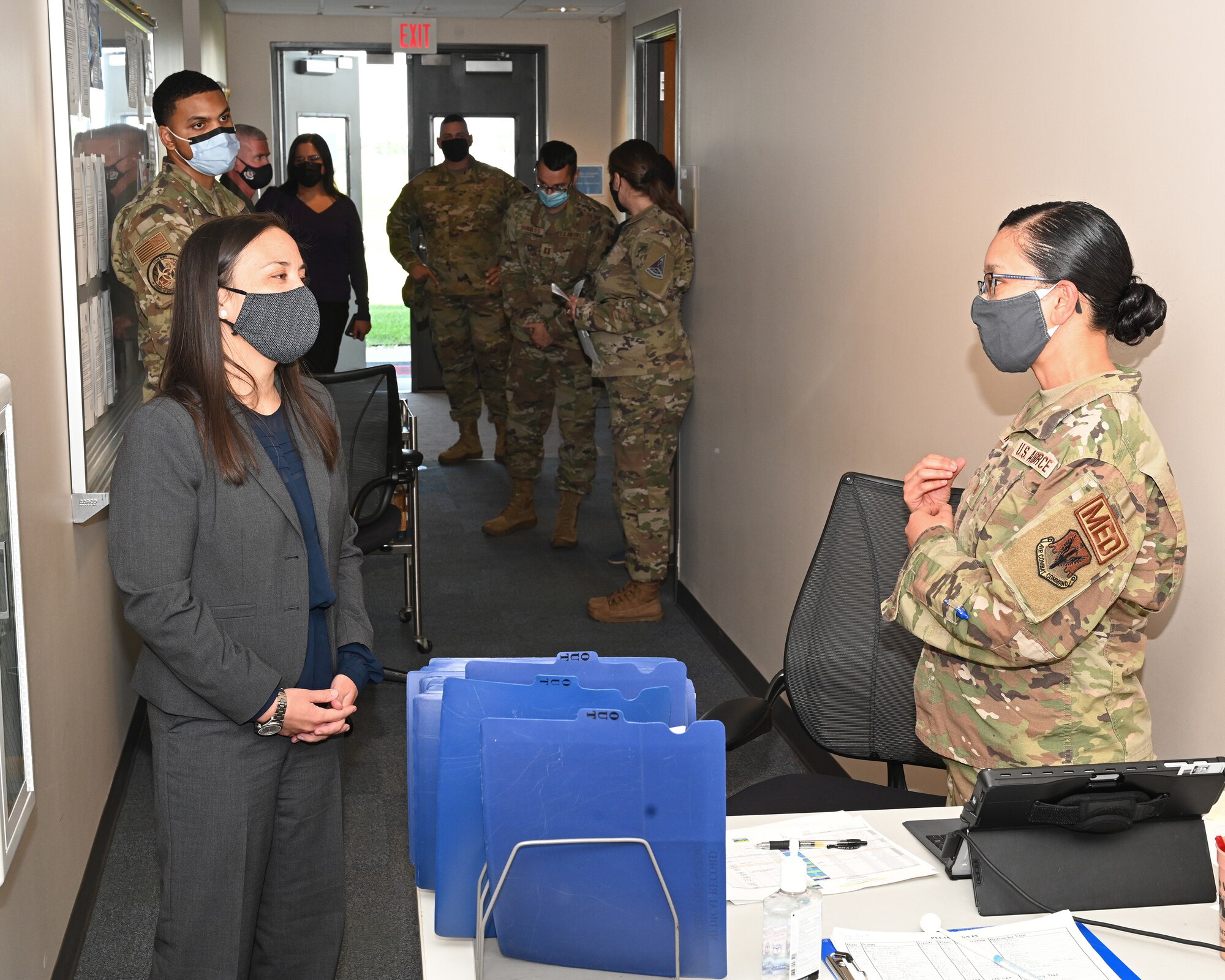 Undersecretary of the Air Force Gina Ortiz Jones speaks with U.S. Air Force Lt. Gen. Michael A. Loh (center), director of the Air National Guard, and U.S. Air Force Brig. Gen. Paul Johnson (right), 175th Wing commander, at Warfield Air National Guard Base at Martin State Airport, Middle River, Md., September 11, 2021. The visit from the Honorable Gina Ortiz Jones is the first to the Maryland Air National Guard during her tenure as the Undersecretary of the Air Force. (U.S. Air National Guard photo by Master Sgt. Christopher Schepers)