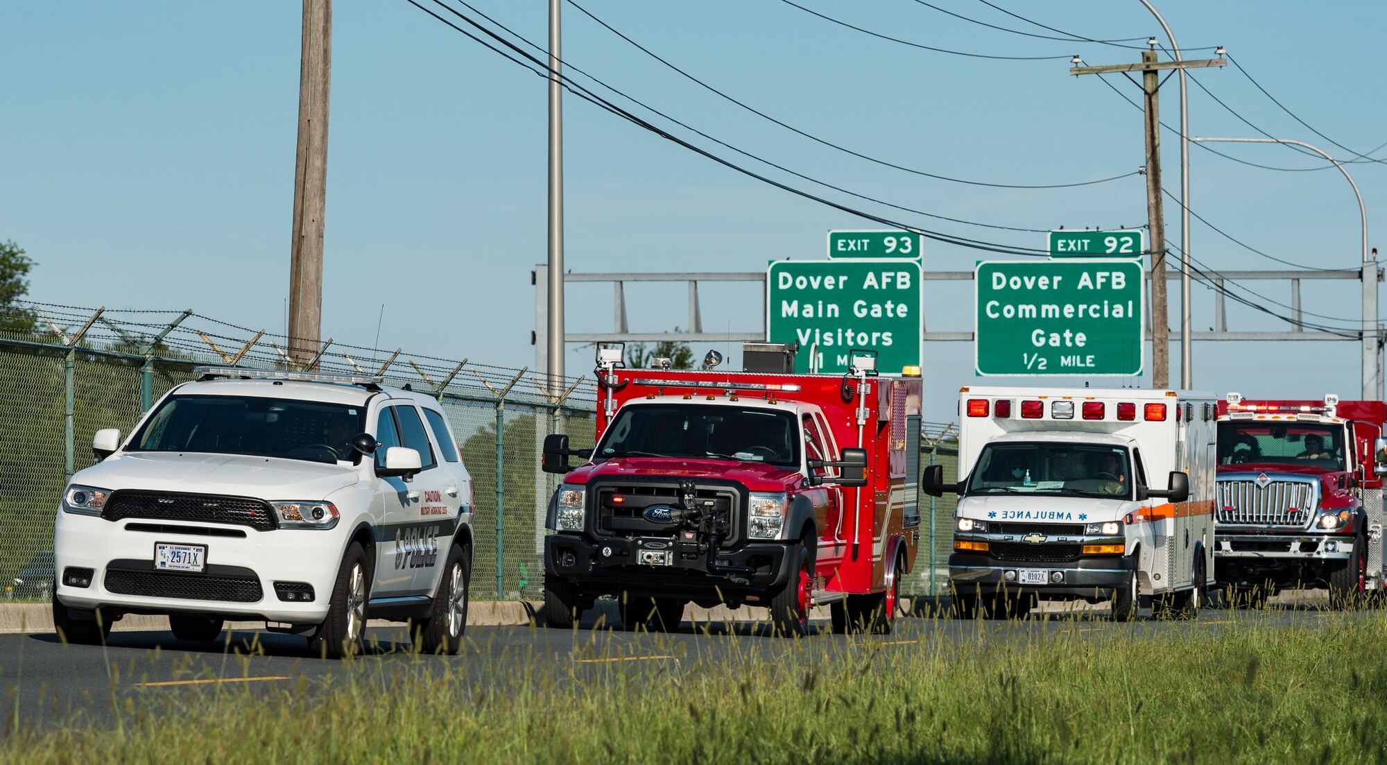 A procession of first response vehicles make their way to the Air Mobility Command Museum’s 9/11 Memorial on Dover Air Force Base, Delaware, Sept. 11, 2021. The base hosted a 20th Anniversary 9/11 Remembrance Ceremony to remember and honor those who perished in the attacks on Sept. 11, 2001. (U.S. Air Force photo by Roland Balik)