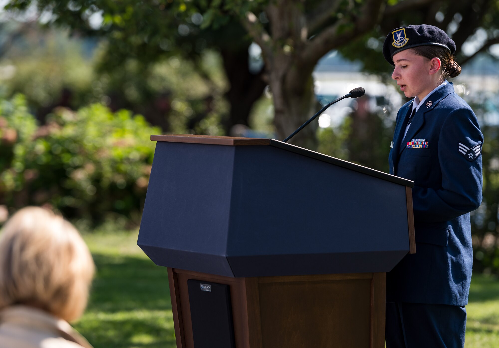 Senior Airman Lindsay Wells, 436th Security Forces Squadron response force member, reads the Security Forces Prayer during the 20th Anniversary 9/11 Remembrance Ceremony held at the Air Mobility Command Museum’s 9/11 Memorial on Dover Air Force Base, Delaware, Sept. 11, 2021. Wells read the prayer to honor the 71 law enforcement officers who died while responding to the terrorist attacks on the World Trade Center in New York Sept. 11, 2001.(U.S. Air Force photo by Roland Balik)