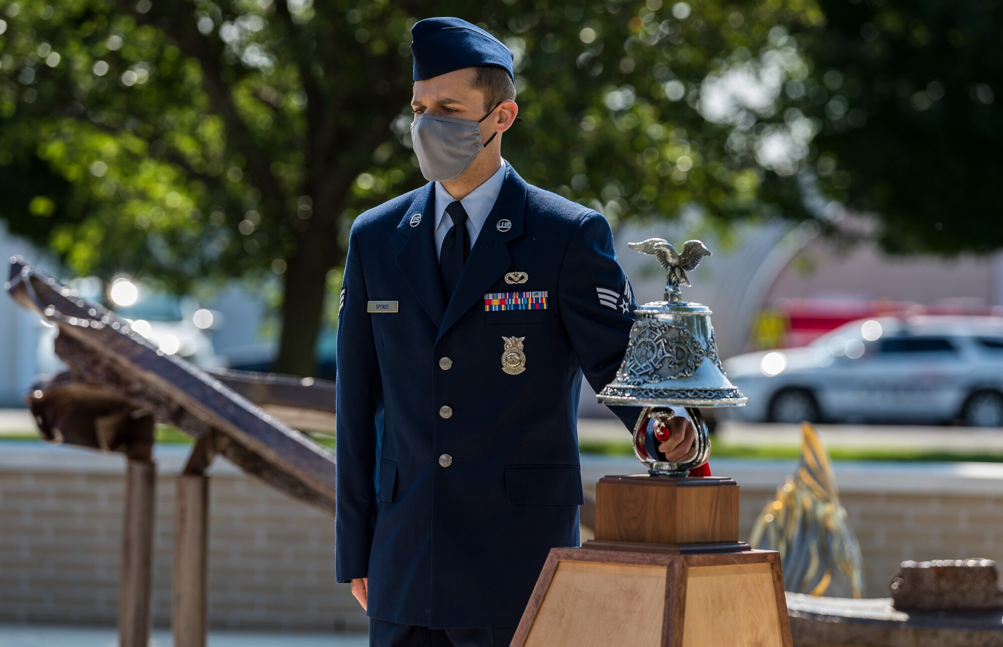 Senior Airman Kyle Spence, 436th Civil Engineer Squadron fire department operator, performed  “Striking the Four Fives” during the 20th Anniversary 9/11  Remembrance Ceremony held at the Air Mobility Command Museum’s 9/11 Memorial on Dover Air Force Base, Delaware, Sept. 11, 2021. Spence rang the bell five times, for four sets, to honor the 343 firefighters who died while responding to the terrorist attacks on the World Trade Center in New York Sept. 11, 2001. (U.S. Air Force photo by Roland Balik)