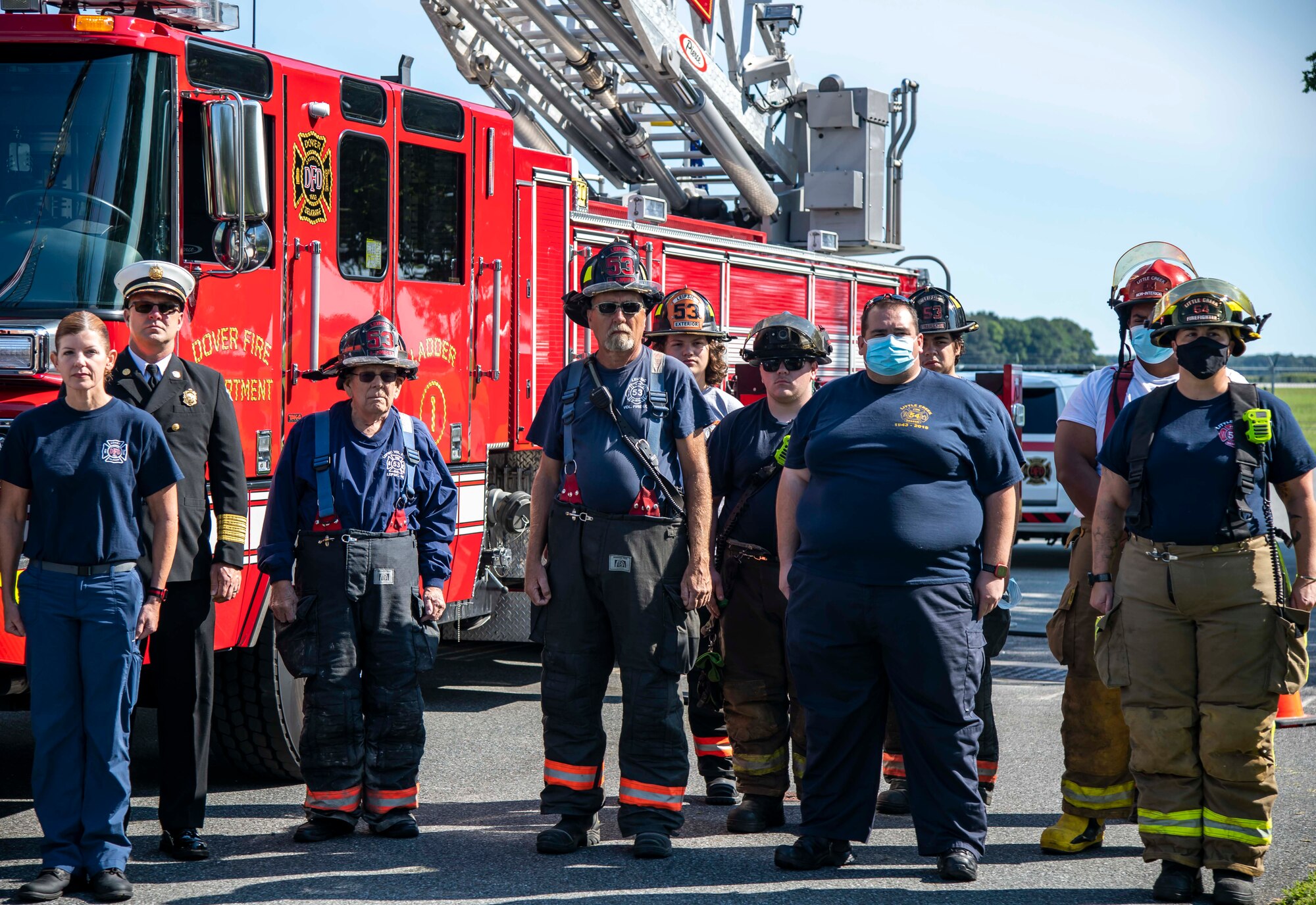 Members of the Dover Fire Department look on during the 20th Anniversary 9/11 Remembrance Ceremony held at the Air Mobility Command Museum’s 9/11 Memorial on Dover AFB, Delaware, Sept. 11, 2021. The base hosted the ceremony to remember and honor those who perished in the attacks on Sept. 11, 2001. (U.S. Air Force photo by Senior Airman Stephani Barge)