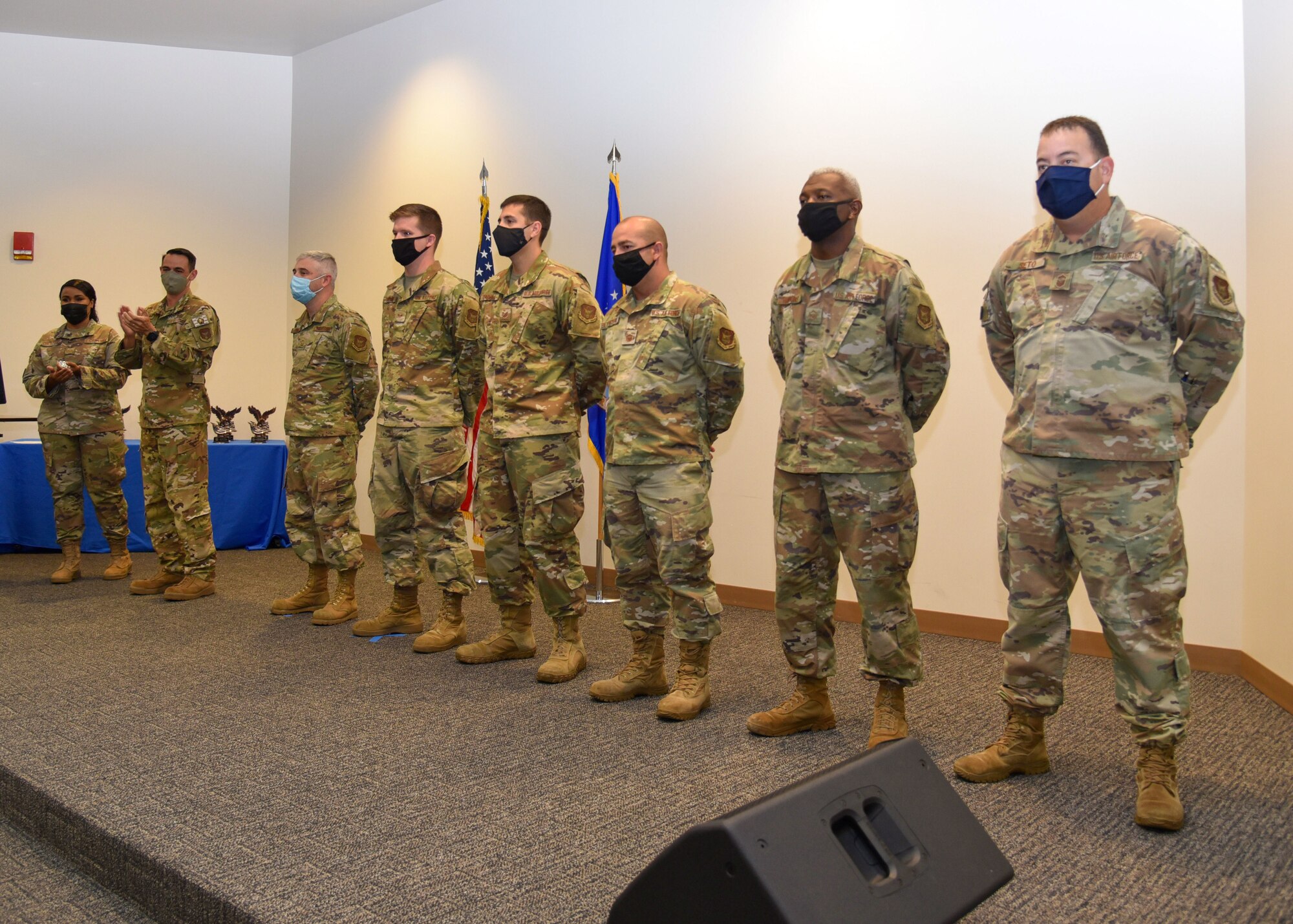 Col. Stuart M. Rubio, 403rd Wing commander, recognizes members of the 403rd Maintenance Group during a commander’s call at Keesler Air Force Base, Biloxi, Mississippi, September 12, 2021. The group worked extensively to restore the wing of a WC-130J assigned to the 53rd Weather Reconnaissance Squadron after a fire burned a basketball-sized hole through it. (Air Force photo by Tech. Sgt. Michael Farrar)