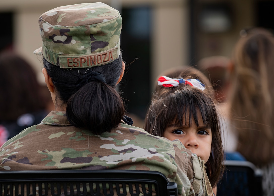 A mom holds her daughter