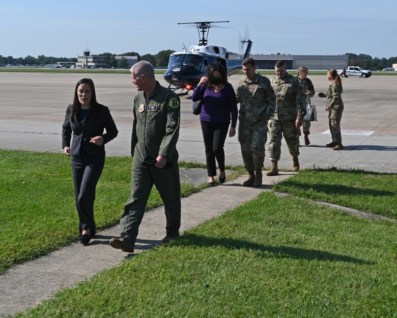 Under Secretary of the Air Force Gina Ortiz Jones speaks with Brig. Gen. Paul Johnson, 175th Wing commander, after landing at Warfield Air National Guard Base at Martin State Airport, Middle River, Md., Sept. 11, 2021. The visit by Jones is the first to the Maryland ANG during her tenure as the under secretary.