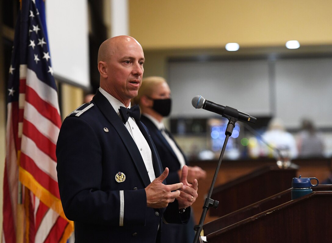 U.S. Air Force Col. William Hunter, 81st Training Wing commander, delivers remarks during the Senior NCO Induction Ceremony inside the Bay Breeze Event Center at Keesler Air Force Base, Mississippi, Sept. 10, 2021. More than thirty enlisted members were recognized during the event. (U.S. Air Force photo by Kemberly Groue)