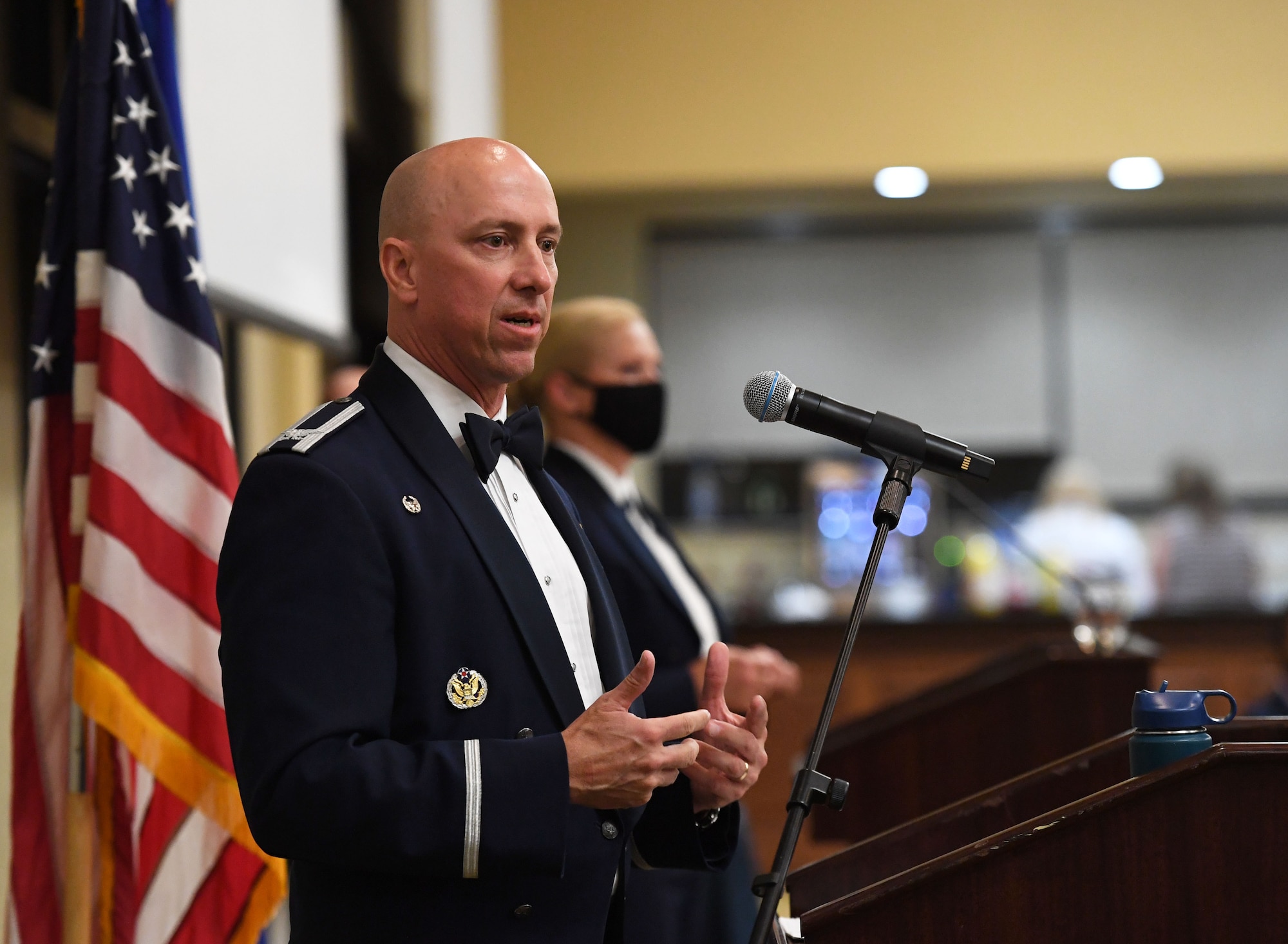 U.S. Air Force Col. William Hunter, 81st Training Wing commander, delivers remarks during the Senior NCO Induction Ceremony inside the Bay Breeze Event Center at Keesler Air Force Base, Mississippi, Sept. 10, 2021. More than thirty enlisted members were recognized during the event. (U.S. Air Force photo by Kemberly Groue)