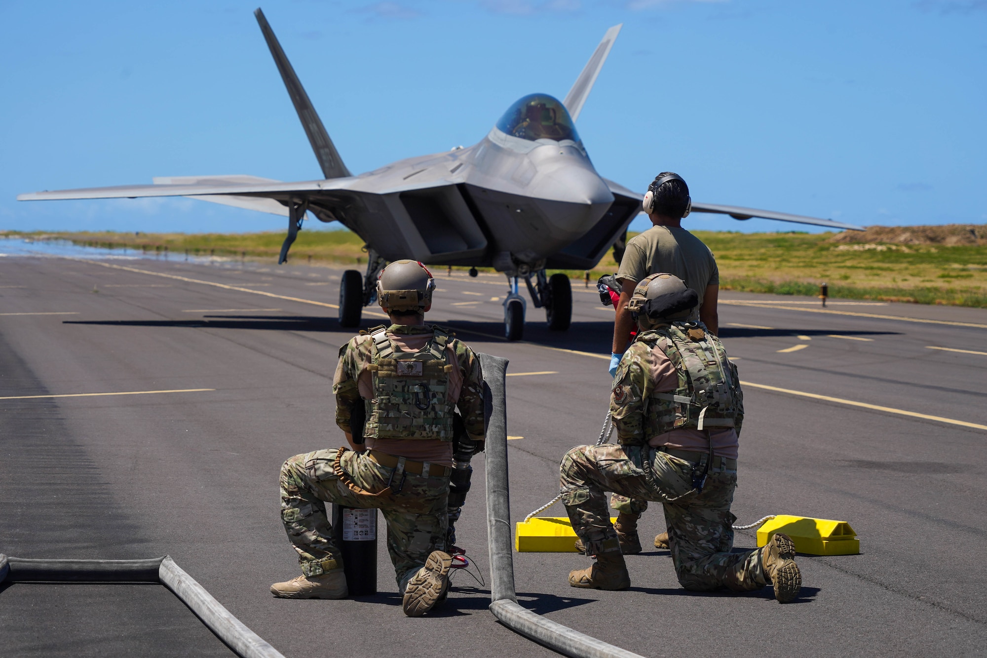 Airmen from the 15th Wing and Hawaiian Air National Guard worked alongside Airmen from the 353d Special Operations Group to conduct static forward area refueling point training during an Agile Combat Employment training exercise at Pacific Missile Range Facility Barking Sands, Hawaii, September 8, 2021. The ACE concept utilizes Multi-Capable Airmen to refuel, rearm, and perform maintenance to fighter jets ensuring the aircraft are ready to rapidly deploy. (U.S. Air Force photo by Airman 1st Class Makensie Cooper)