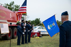 97th Air Mobility Wing (AMW) Airmen post the colors during the 97th AMW Remembrance Ceremony at Altus Air Force Base, Oklahoma, Sept. 11, 2021. Traditionally, this is performed by the honor guard, but was performed by Airmen from the 97th Security Forces Squadron and the 97th Civil Engineer Squadron for the 9/11 ceremony. (U.S. Air Force photo by Senior Airman Amanda Lovelace)