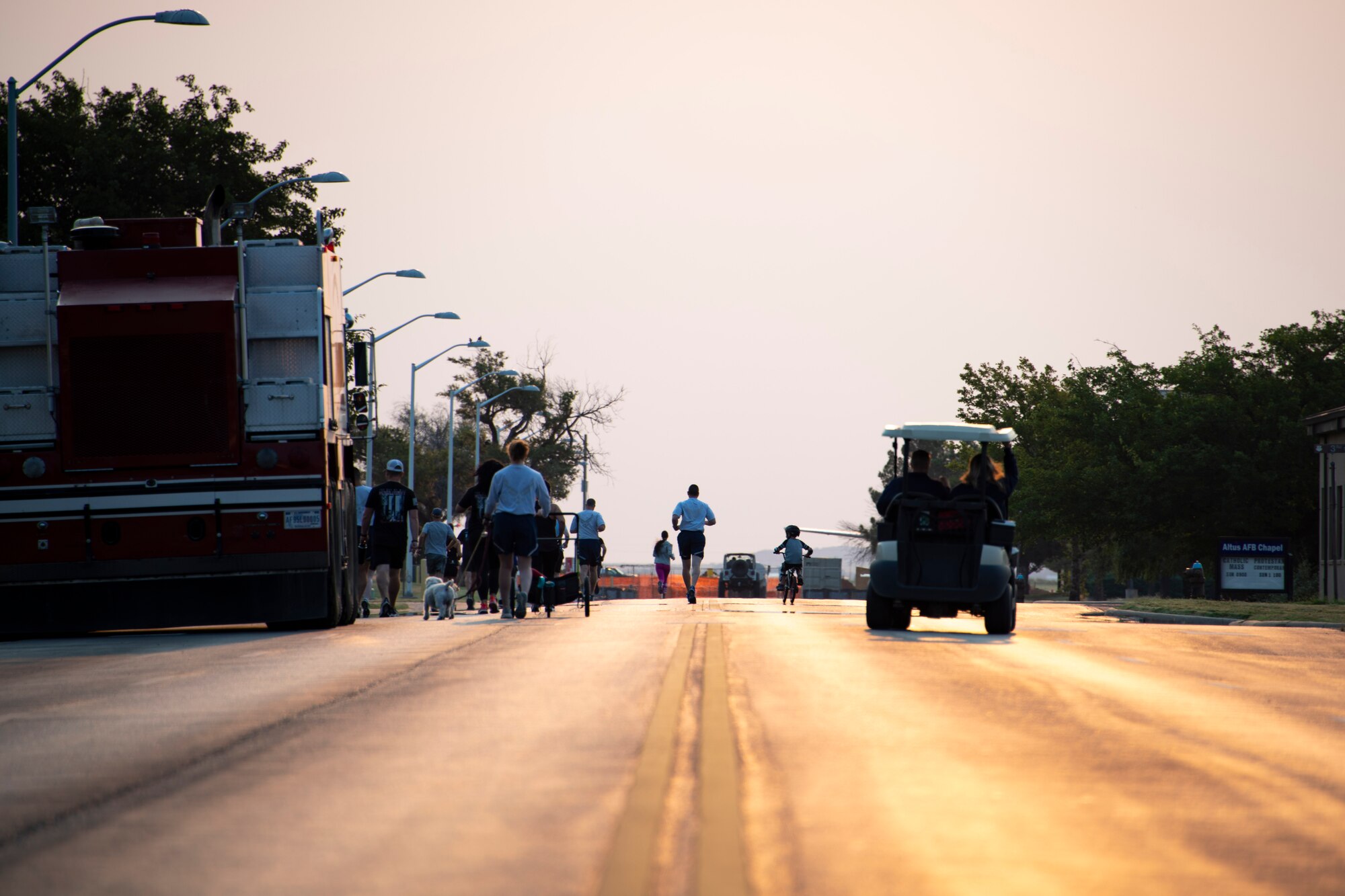 Airmen and their families start the 9/11 Memorial Run to Remember at Altus Air Force Base, Oklahoma, Sept. 11, 2021. The run is held annually after the 97th Air Mobility Wing Remembrance Ceremony and offers three different 5-, 9-, or 11-mile routes for participants. (U.S. Air Force photo by Senior Airman Amanda Lovelace)