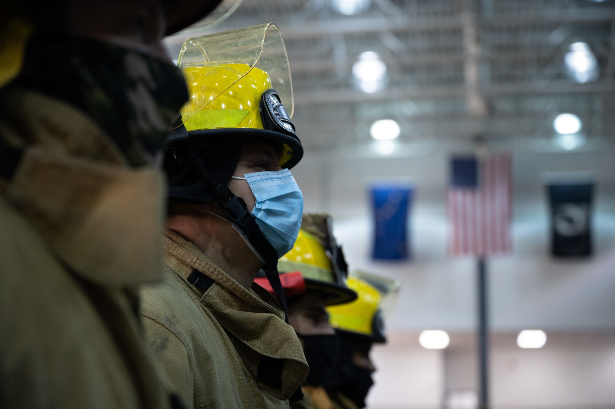 U.S Air Force firefighters assigned to the 354th Civil Engineering Squadron stand in formation during a 9/11 remembrance ceremony on Eielson Air Force Base, Alaska, Sept. 11, 2021.