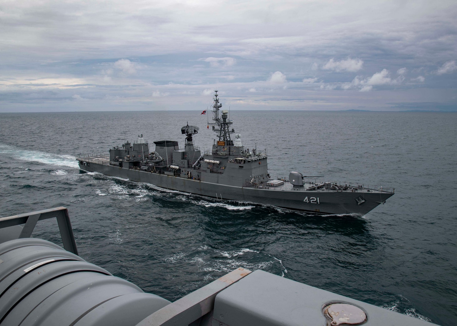 Royal Thai Navy ship HTMS Naresuan (FFG 421) sails alongside the amphibious transport dock ship USS Green Bay (LPD 20) during an exercise for Cooperation Afloat Readiness and Training (CARAT), Sept. 8, 2021.