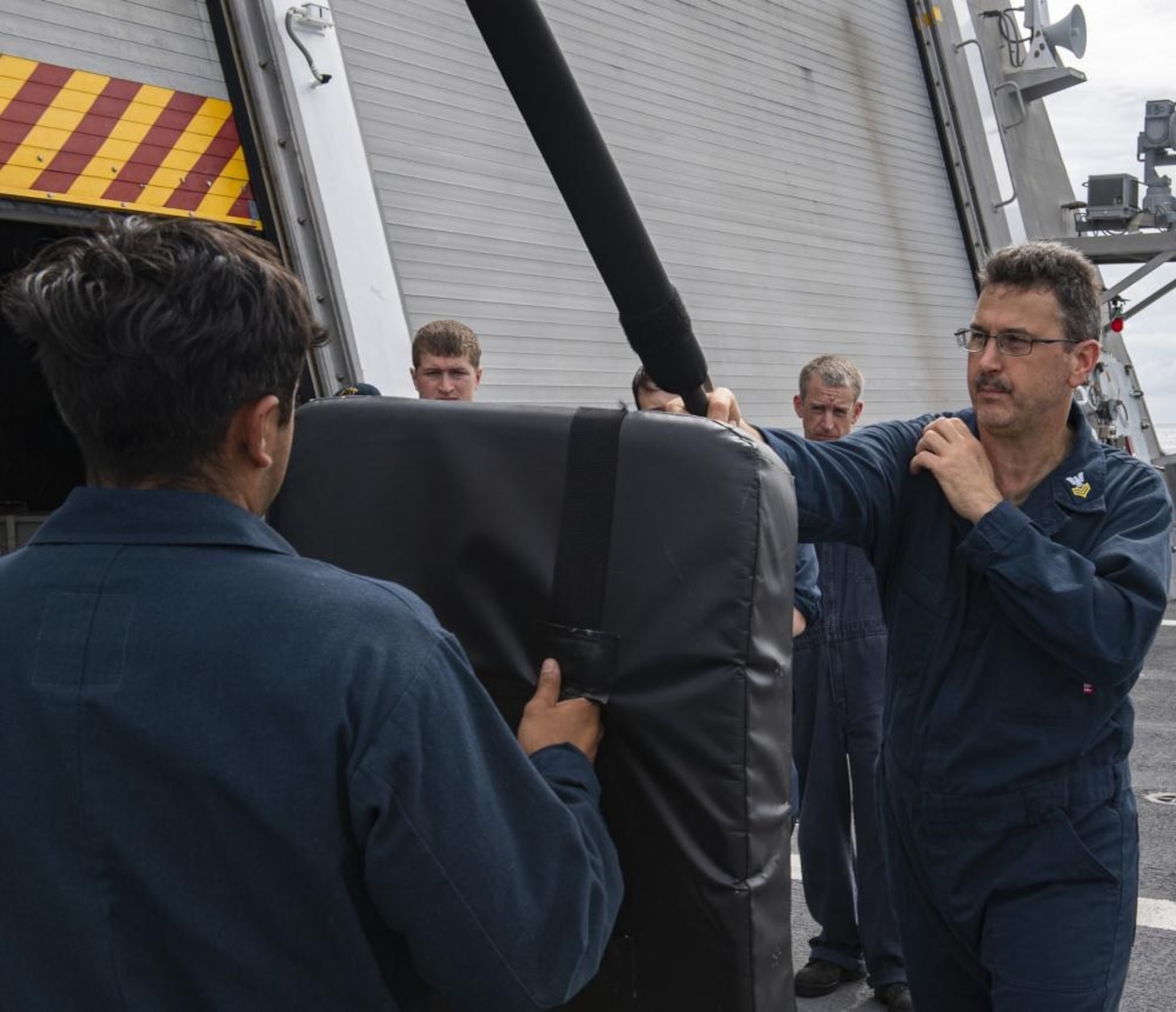 SULU SEA (SEP. 09, 2021) Mineman 1st Class Frederick Werner from Haddonfield, N.J., conducts non-lethal weapons training exercise aboard the Independence-variant littoral combat ship USS Tulsa (LCS 16), Sep. 09, 2021. Tulsa, part of Destroyer Squadron Seven, is on a rotational deployment in the U.S. 7th Fleet area of operation to enhance interoperability with partners and serve as a ready-response force in support of a free and open Indo-Pacific region. (U.S. Navy photo by Mass Communication Specialist 3rd Class Richard Cho)