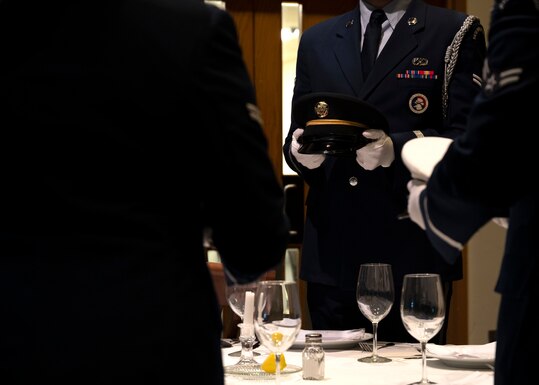 The 62nd Airlift Wing Honor Guard perform the Missing Man Table and Honors Ceremony during the opening ceremony for POW/MIA Remembrance Week at Joint Base Lewis-McChord, Washington, Sept. 13, 2021. McChord Field has several events planned this week to honor the lives and sacrifices of those men and women who were prisoners of war or missing in action, including a 24-hour run, a motorcycle ride and a wreath laying ceremony. (U.S. Air Force photo by Senior Airman Zoe Thacker)