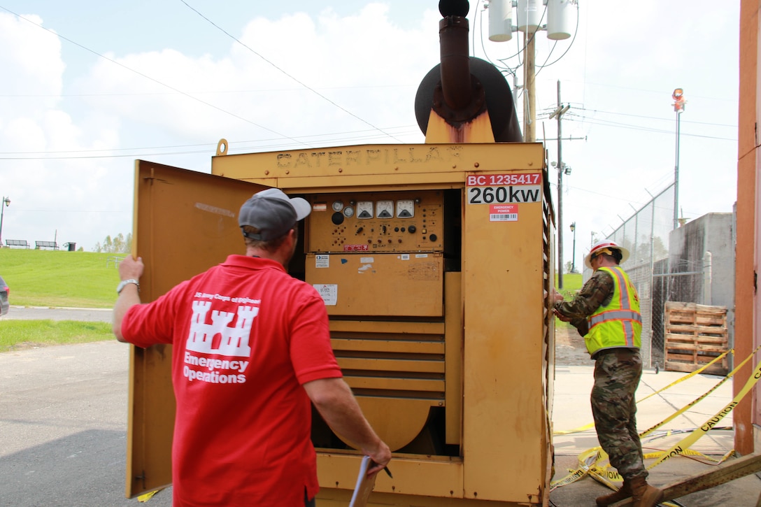 Capt. Aaron Miley and Michael Maaninen, both from Honolulu District, support the Federal Emergency Management Agency (FEMA) assigned Temporary Emergency Power Mission as part of the U.S. Army Corps of Engineers Hurricane Recovery mission in southeastern Louisiana.