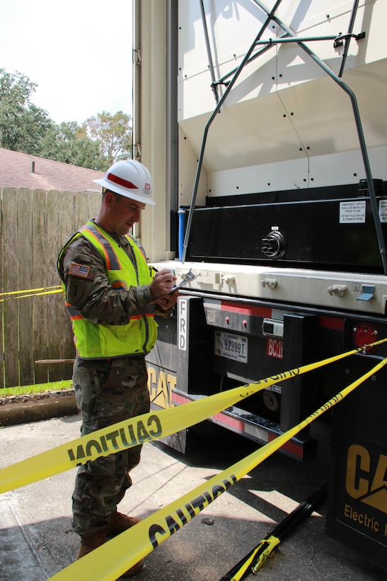 Capt. Aaron Miley and Michael Maaninen, both from Honolulu District, support the Federal Emergency Management Agency (FEMA) assigned Temporary Emergency Power Mission as part of the U.S. Army Corps of Engineers Hurricane Recovery mission in southeastern Louisiana.