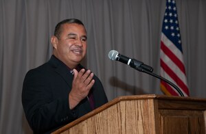 Former Army Staff Sgt. Andrew Ramirez recounts his time as a prisoner of war in 1999 during a POW/MIA Remembrance Ceremony and dinner at Edwards Air Force Base, California, Sept. 10. Ramirez and two other Soldiers from his unit spent 32 days in captivity during Operation Allied Force in Kosovo in 1999. (Air Force photo by Clay Cupit)