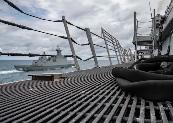 210908-N-YP246-1304 GULF OF THAILAND (Sep. 8, 2021) Royal Thai Navy ship HTMS Bhumibol Adulyadej (FFG 471) steams alongside the amphibious transport dock ship USS Green Bay (LPD 20) during an exercise for Cooperation Afloat Readiness and Training (CARAT) Thailand 2021. In its 27th year, the CARAT series is comprised of multinational exercises, designed to enhance U.S. and partner navies' abilities to operate together in response to traditional and non-traditional maritime security challenges in the Indo-Pacific region. (U.S. Navy photo by Mass Communication Specialist 2nd Class Darcy McAtee)