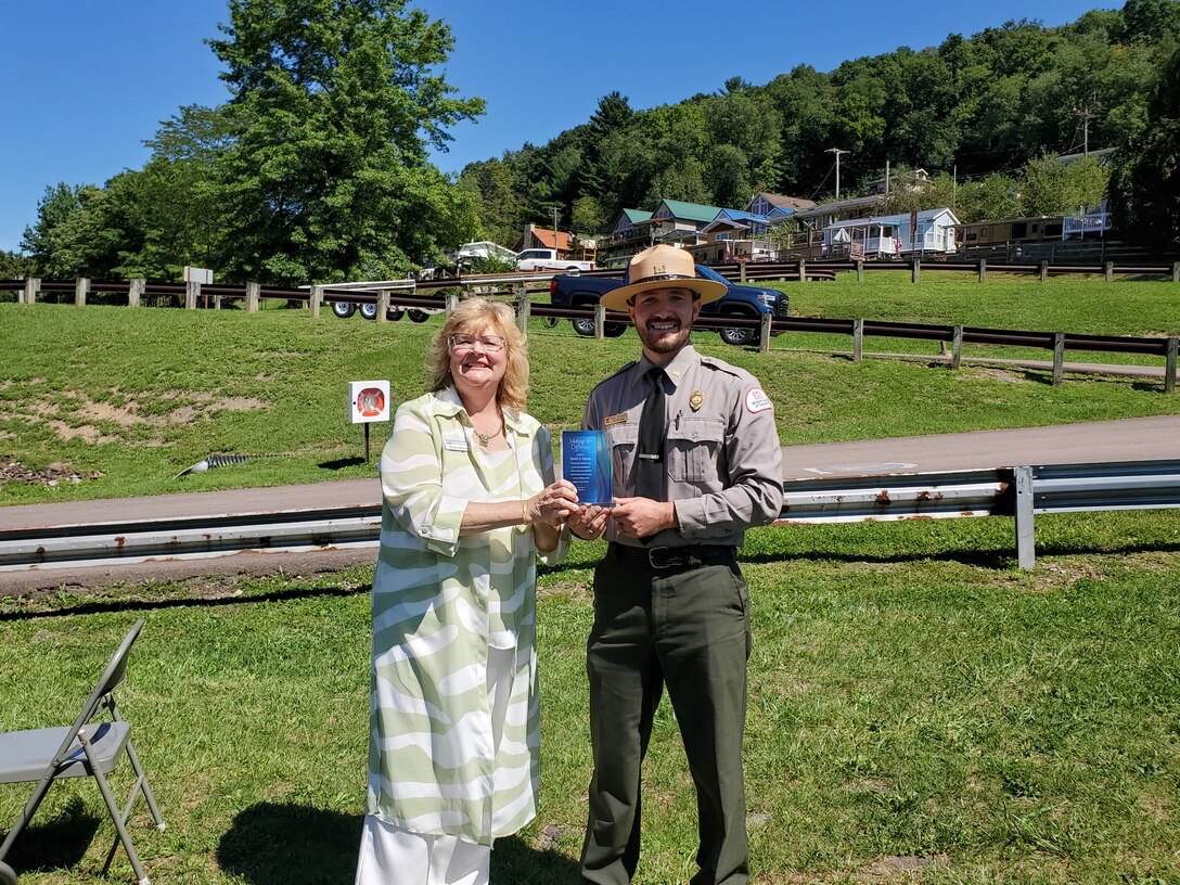 Vince Klinker, a natural resources specialist at Youghiogheny River Lake, received the Friends award from Donna Graham.The U.S. Army Corps of Engineers Pittsburgh District celebrated and acknowledged community partners who worked with the district to expand the Somerfield North Boat Ramp in Addison, PA. The wider ramp provides safer water access by providing additional space during heavy recreational-season traffic, in addition to accommodating vehicle access at low water for those with impaired mobility. (U.S. Army courtesy photo)