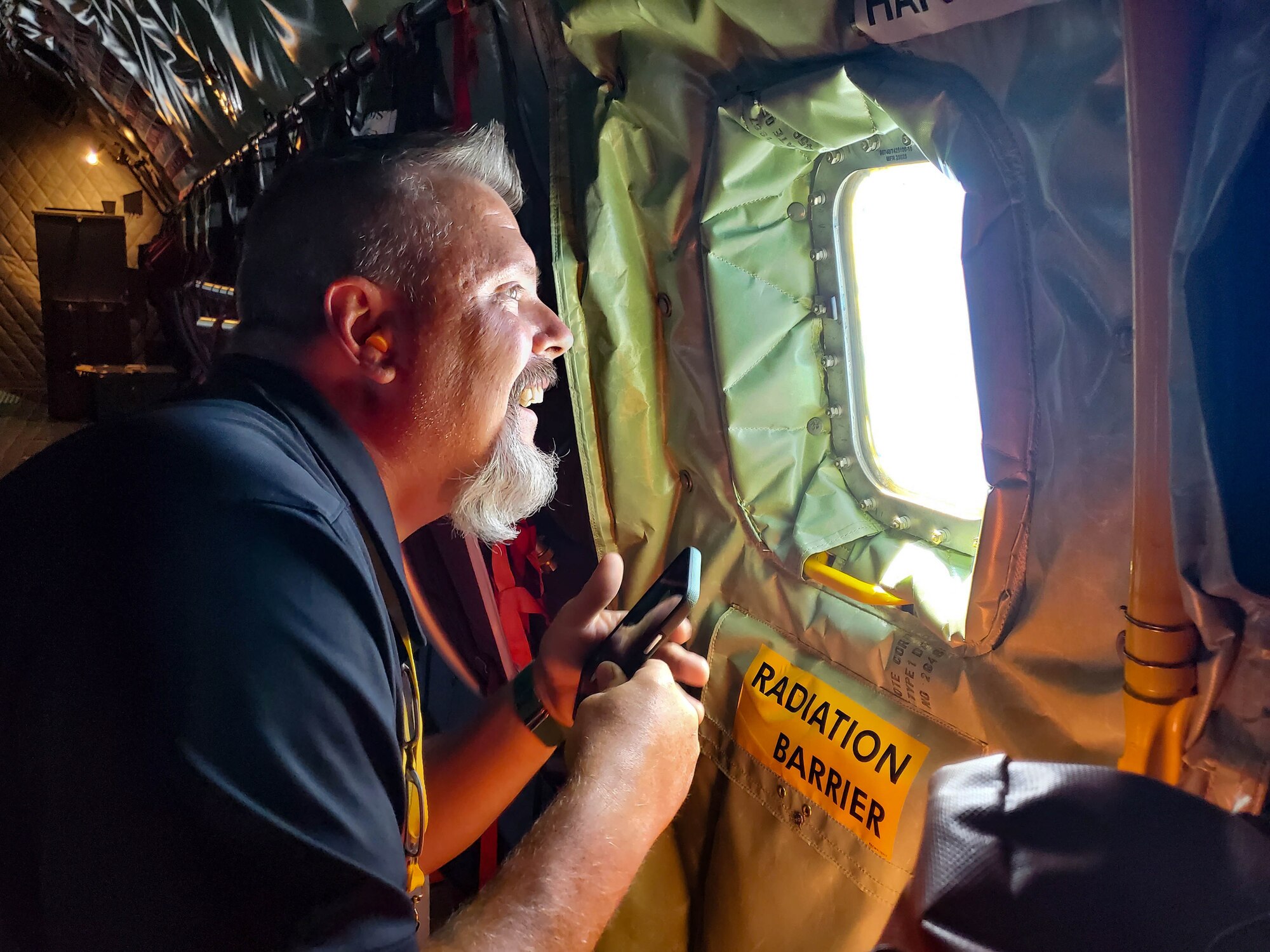 Christopher Anderson, ESGR employer, looks out of the window of a KC-135 aircraft at Grissom Air Reserve Base, Aug. 27, 2021. Employers of the ESGR were nominated directly by their service member to attend this boss lift event. (U.S. Air Force photo by Staff Sgt. Jeremy Blocker)