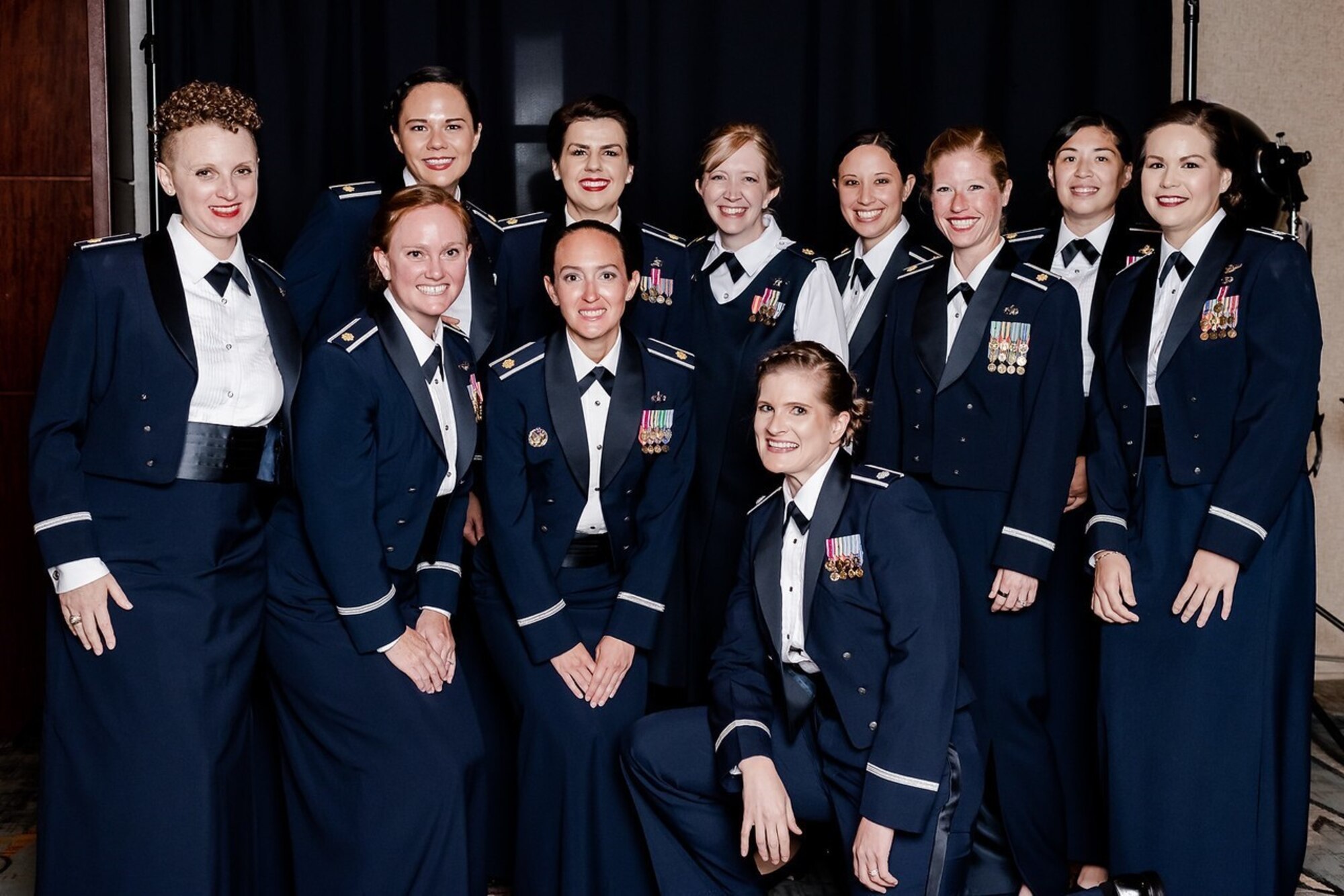 Group of female Airmen graduating in service dress