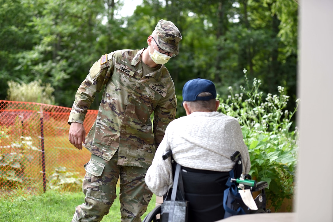 MING members work with veterans at the Michigan Veteran Homes