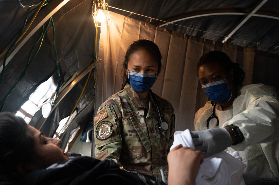 OBGYN's tend to patient.