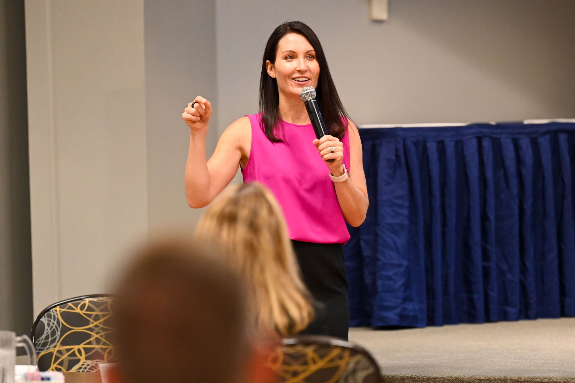 A women speak to an audience
