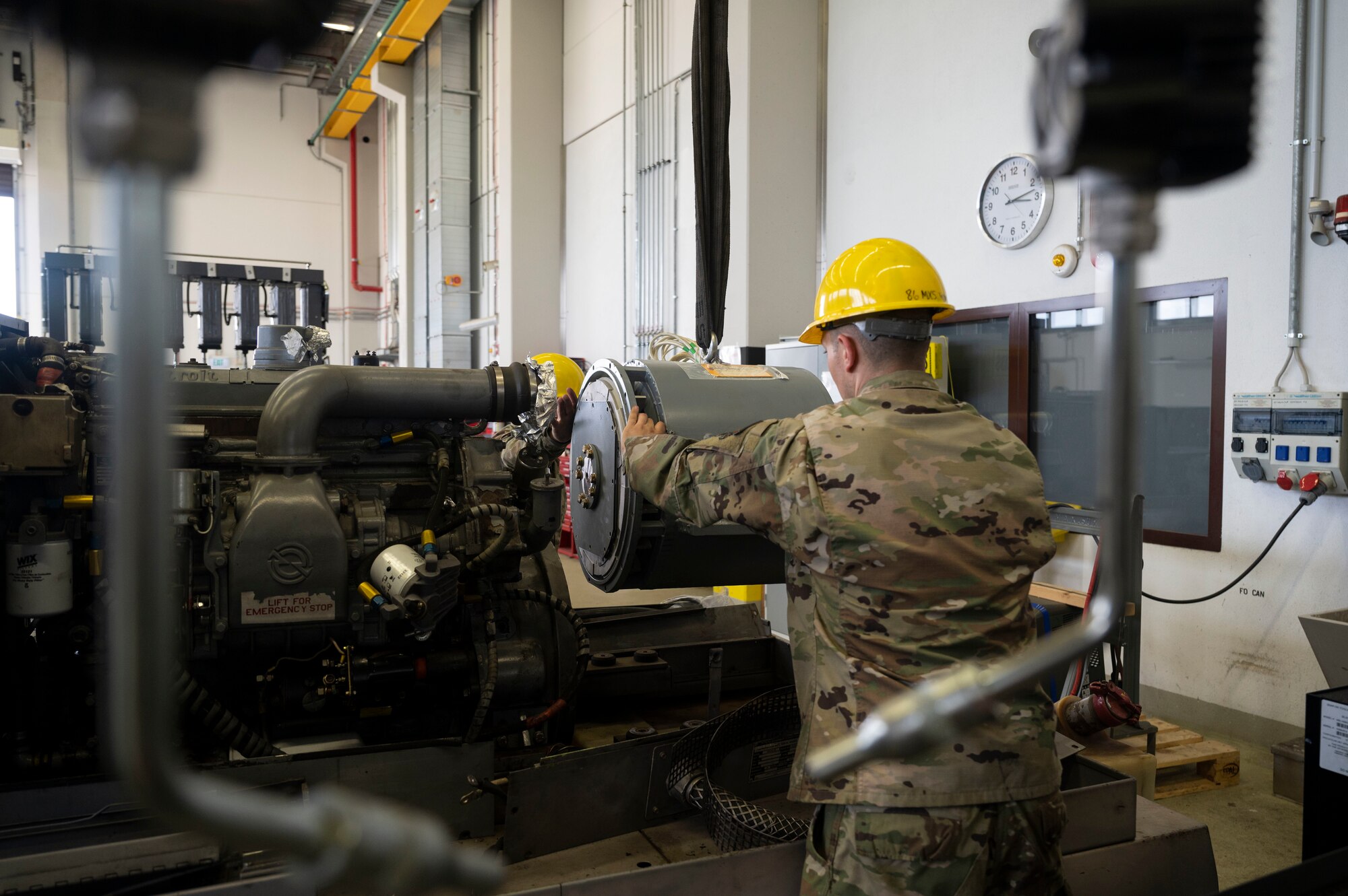Airmen works on equipment.