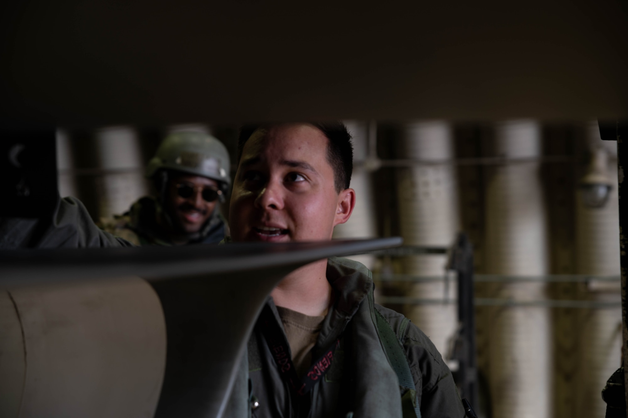 Airmen from the 36th Aircraft Maintenance Unit check the systems of an F-16