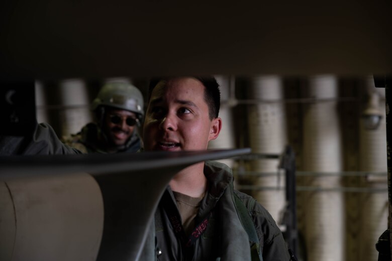 Airmen from the 36th Aircraft Maintenance Unit check the systems of an F-16