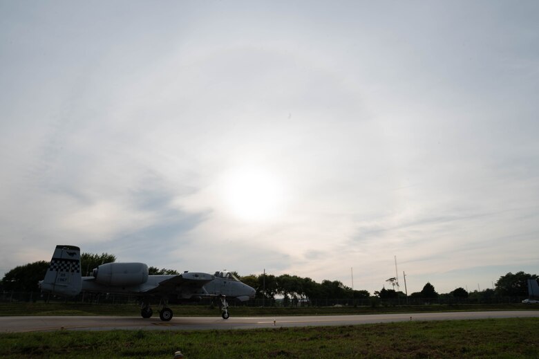 An A-10 Thunderbolt II “Warthog” passes inspection and heads down the runway