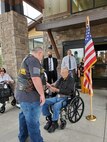 Warren Olsen being honored on 2 August 2021 (100th birthday) by Dave Jorgensen, Commander CVMA 49-3 and other Vets.