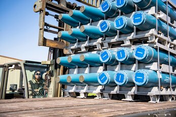 U.S. Air Force Senior Airman Von Mangaya, 420th Munitions Squadron stock pile technician, utilizes a forklift to grab inert assets at RAF Welford, England, Sept. 7, 2021. Airmen from the 420th MUNS transported multiple inert assets to RAF Lakenheath for an upcoming Agile Combat Employment exercise. (U.S. Air Force photo by Senior Airman Eugene Oliver)