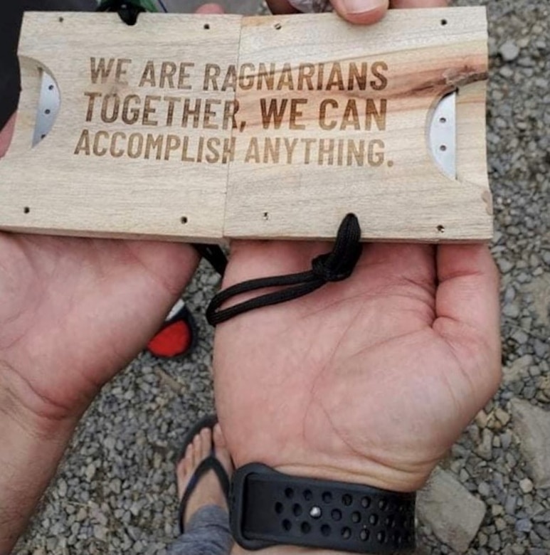 The finisher medals for the black loop, completed in teams of two, can be placed together. (U.S. Army photo by Josh Kaufmann)