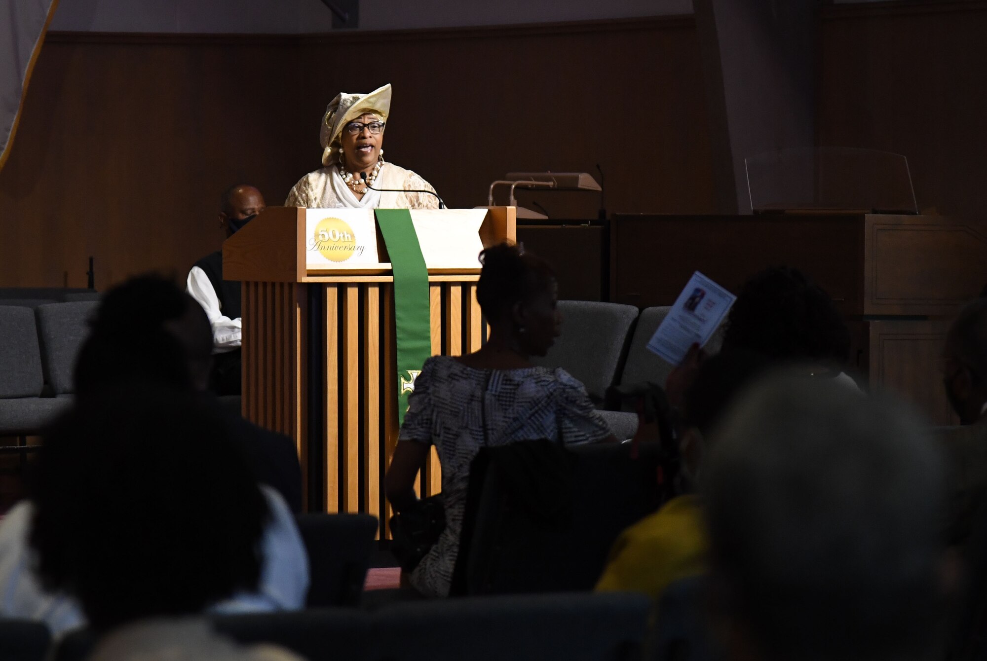 Florence Clay, Gospel Worship Service member, delivers remarks during the 50th Gospel Worship Service Anniversary inside Larcher Chapel at Keesler Air Force Base, Mississippi, Sept. 12, 2021. The service's theme was “Growing Stronger, Growing Deeper, Reaching Higher." (U.S. Air Force photo by Kemberly Groue)