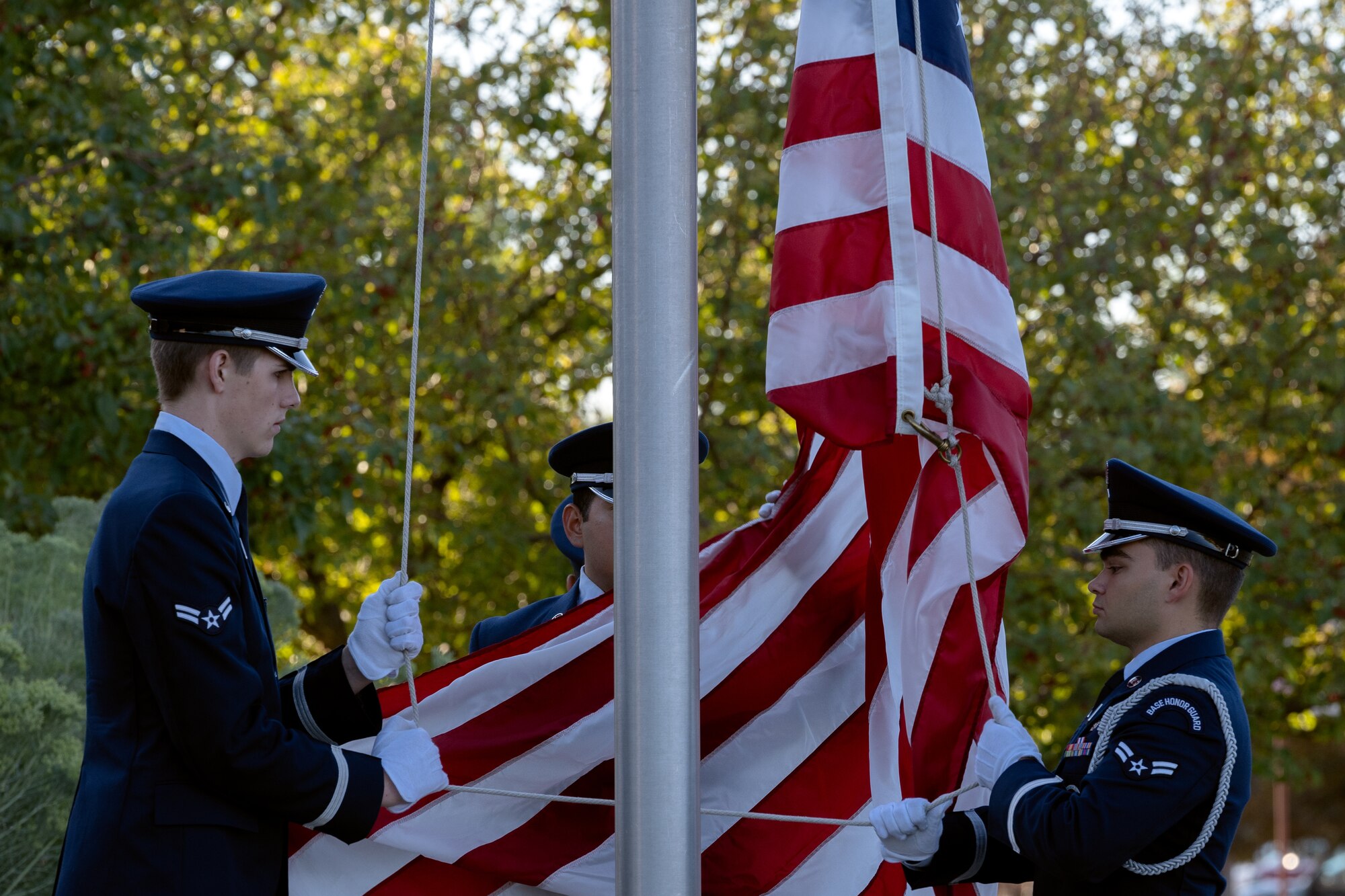 High Frontier Honor Guard Ceremonial Guardsman raise the American flag.