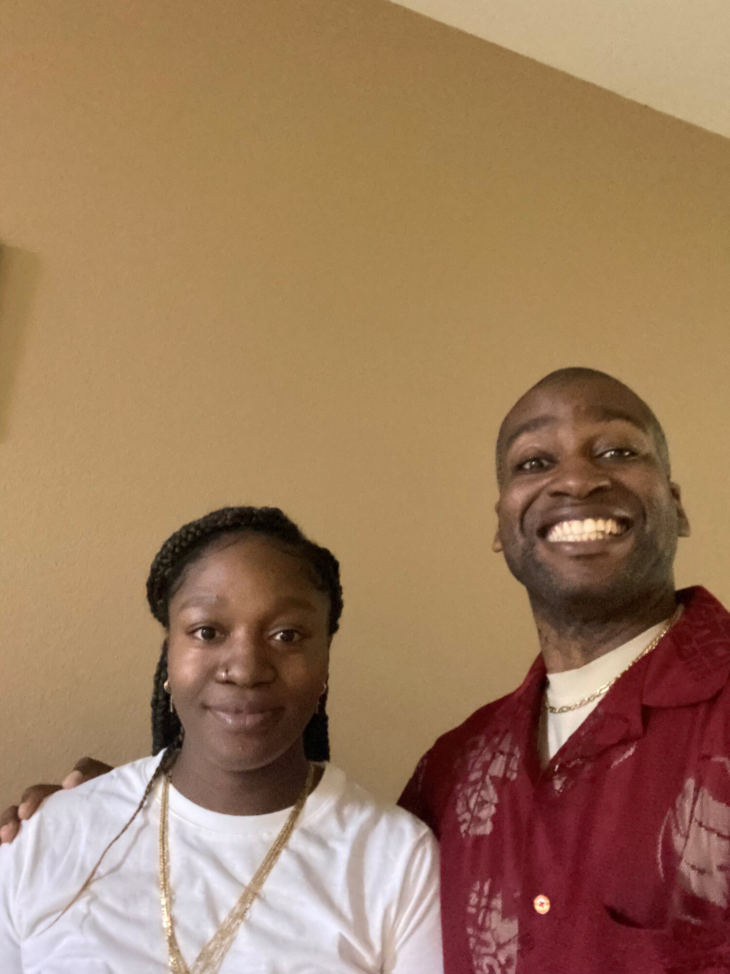 Tech. Sgt. Kenneth Johnson, 9th Force Support Squadron community programming and partnership office non-commissioned officer in charge, and his sister, Janay, pose for a photo Sept. 8, 2021, at her home.