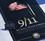 IMAGE: Ahead of the 20th anniversary of the Sept. 11 attacks, Naval Support Activity South Potomac (NSASP) held an in-person event with a virtual element on the Dahlgren Parade Field. Pins were available for in-person attendees.